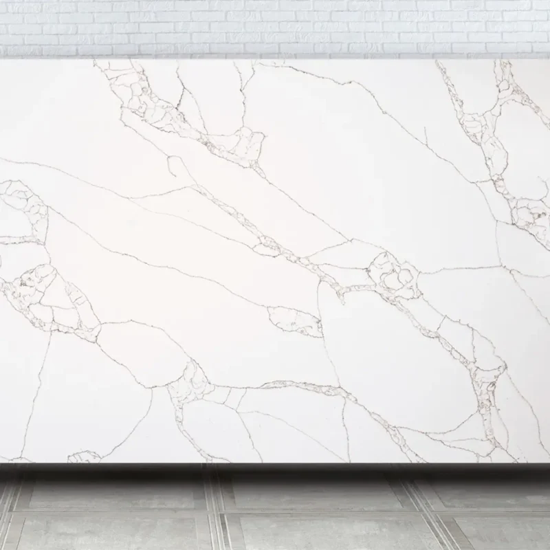 Blat bucătărie quartz Calacatta Bearn Quartz Avant alb cu vene elegante rezistent la pete și zgârieturi.