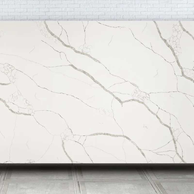 Blat bucătărie quartz Calacatta Dauphine Quartz Avant alb cu vene gri rezistent la pete și zgârieturi.